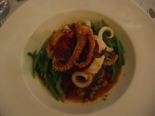Calamaris with chorizo and beans