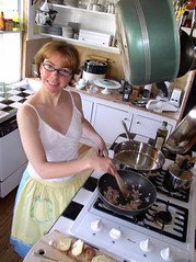 Sandee makes homefries in our old kitchen.