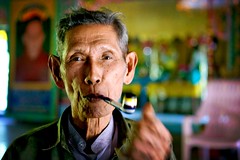 smoking the pipe in a buddhist monastery