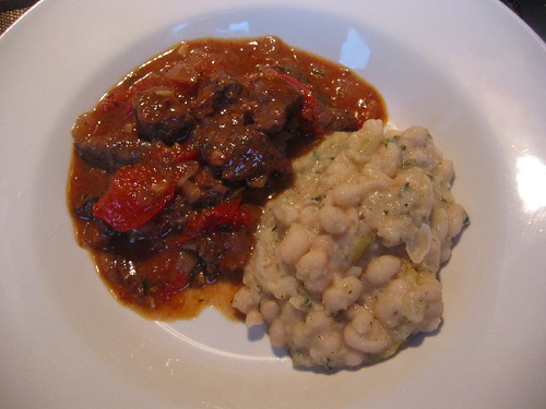 Beef tomato stew with herbed white beans